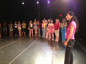 Nejla leads the young dancers in an improvisation during her Show and Tell at Schaeffer Theater.