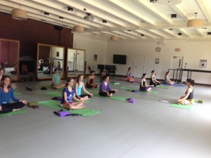 Head Counselor Mary Lachman leads a yoga workshop for the dancers on their day off.